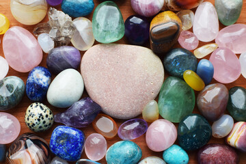 Gemstone background with space for text, healing crystals. Labradorite, amethyst, fluorite, lapis...