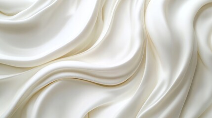 Soft, flowing ivory silk fabric with elegant, smooth waves and folds.