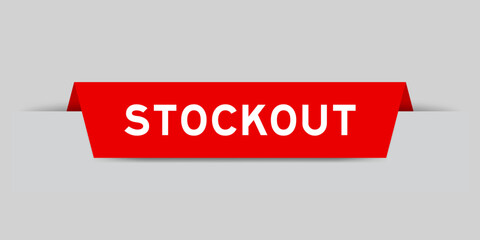 Red color inserted label with word stockout on gray background