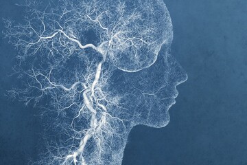 Perfil humano con un intrincado patrón de vasos sanguíneos superpuesto, sobre un fondo azul oscuro.
