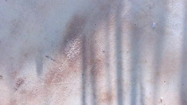 rusty abstract background. brown background. fine texture. paraffin texture. shadow on brown background. rust. rust streaks
