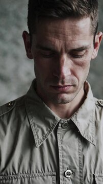 Man with depressive expression, symbol of PTSD and emotional trauma, vertical video