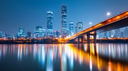 Obraz premium Night Cityscape, Bridge, River Reflection - Vibrant Cityscapes: The.