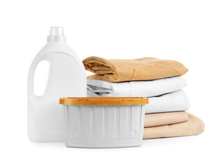 Stack of clean clothes, laundry basket and detergent bottle isolated on white background