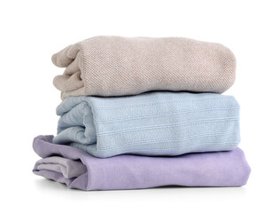 Stack of clean folded clothes isolated on white background