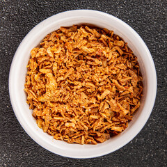 Fried onion crispy onions appetizer vegetables dish fresh delicious gourmet food background on table rustic food top view copy space vegetarian and vegan food