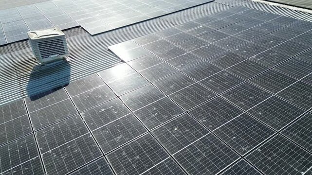 Solar Panels On Roof Of Industrial Building (Dirty Solar Panels)
