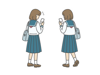 スマホを見る女子高生の後ろ姿