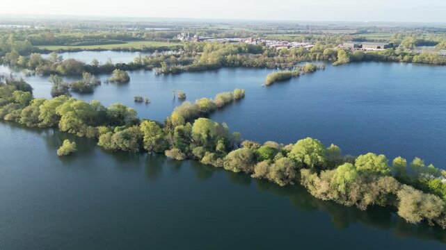 Lake Panning View Exhibiting Sun Reflections and Greenery