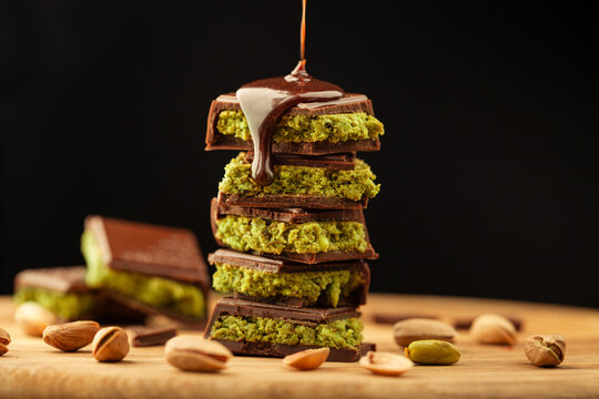 Dubai Chocolate with Pistachio poured with chocolate on desk
