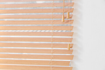 Window with wooden blinds in room