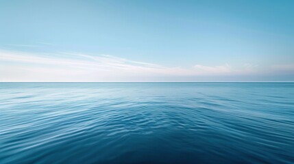 Minimalist seascape, horizon line dividing the blue sky and water, sense of calm and vastness