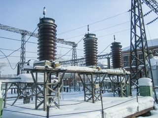 Power plant equipment for industrial energy distribution. High voltage substation insulator. Electricity infrastructure, transmission facilities, high power electrical supply