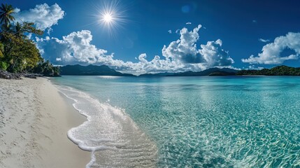 Tropical Paradise with Crystal Clear Turquoise Water, White Sand Beach, and Brilliant Sunburst