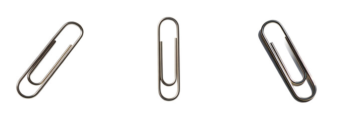 Three shiny metallic paper clips arranged on a bright white surface