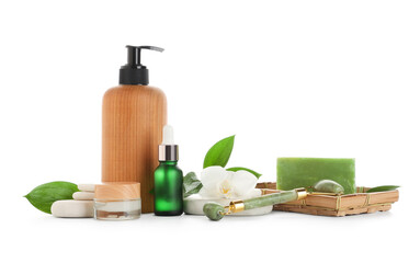 Composition with cosmetic products and spa accessories on white background