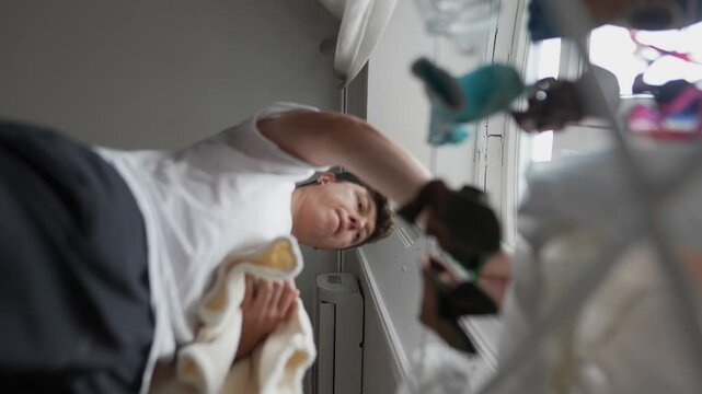 A Dynamic Scene Featuring Laundry Sorting in a Bright, Cheerful Room Full of Light