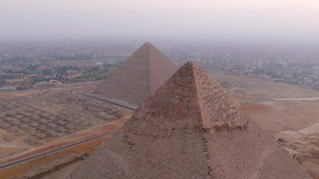 Flying Over The Pyramids of Egypt To The Great Pyramid of Giza In Cairo, Egypt. - aerial shot