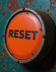 Close-Up of an Old Industrial Reset Button with Rusty Texture and Vintage Color Palette in an Urban Setting