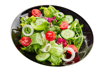 Vegetable salad tomato, cucumber, lettuce, green leaf lettuce, onion appetizer vegetable dish fresh gourmet food background rustic food top view copy space keto and paleo diet vegetarian vegan food