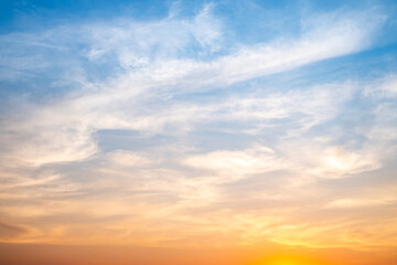 Beautiful , luxury soft gradient orange gold clouds and sunlight on the blue sky perfect for the background, take in evening,Twilight, Large size, high definition landscape photo