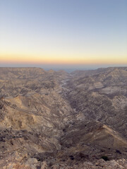 Sunset view on the canoyn and coast of Ash Shuwamiyah in Southern Oman