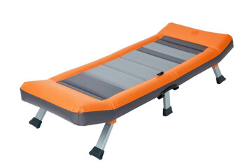 Portable orange cot isolated on PNG transparent background, cut out