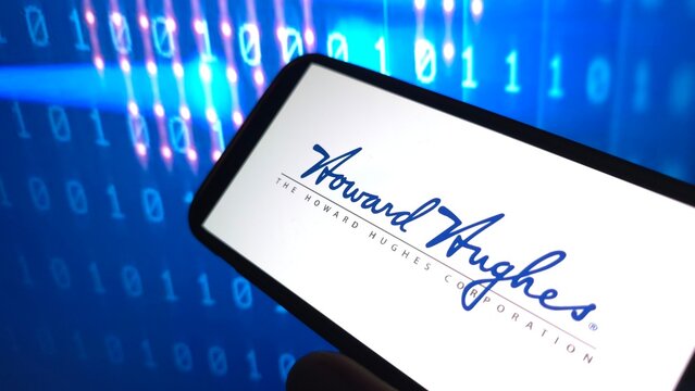 Konskie, Poland - April 12, 2025: Howard Hughes Holdings company logo displayed on mobile phone