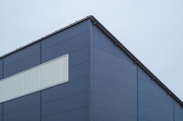 Corner of modern industrial building showing clean lines and minimalist design