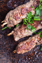 Kofta, minced beef meat on skewers.