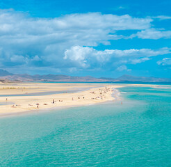 Stunning high aspect aerial panoramic view of the beautiful tropical looking beach, lagoon and sand dunes at Sotavento Risco del Paso beach near Costa Calma on Fuerteventura Canary Islands Spain