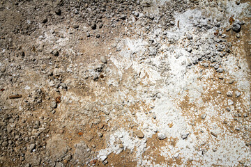 Concrete and cement stains on ground. Abstract messy construction background