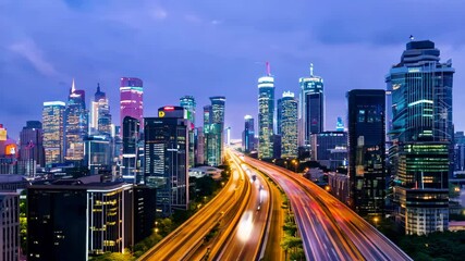Busy highway cuts through neon lit metropolis, night traffic forging bright lines of motion. Rapid flow showcases urban progress, fueling modern energy for future oriented transport solutions.