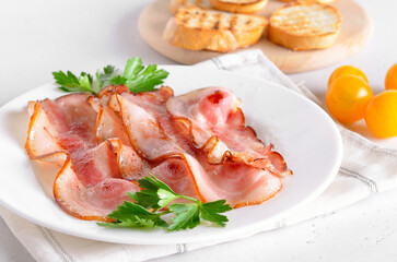 Fried bacon slices