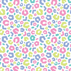Simple pastel leopard skin print seamless pattern. Cheetah skin flat style background in retro boho colors. Hand drawn gender neutral pastel leopard print background. Cute and fun kids safari design.