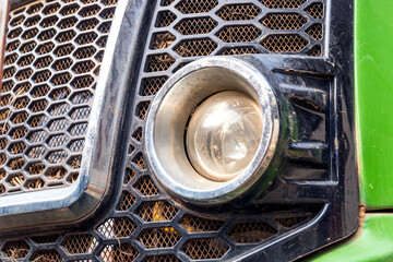 Fototapeta premium The lighting headlights on modern plowshares