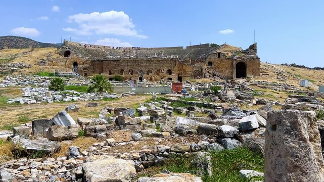 HIERAPOLIS in Denizli, TURKEY, August 13, 2024: The ancient city of Hierapolis near Pamukkale, against the backdrop of nature and mountains. The Phrygian period.UNESCO.4K