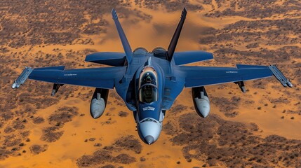 A powerful military aircraft glides effortlessly above vast sandy terrain under the sun