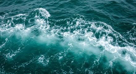 Fototapeta premium Ocean Wave Crashing with Foam Creating Texture and Sea Movement