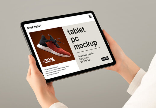 hand holding tablet pc mockup