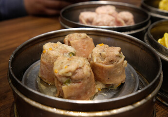 Bacon-wrapped dimsum in a Chinese restaurant in Baguio City.