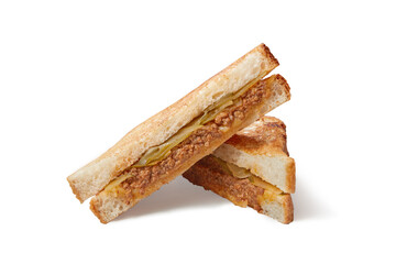 Slices of club sandwich made with meat, cheese and cucumber isolated on white