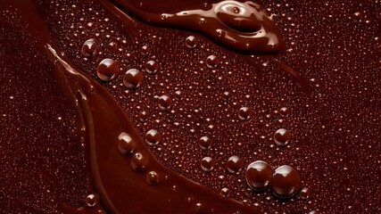 Texture of melted dark chocolate with air pores

