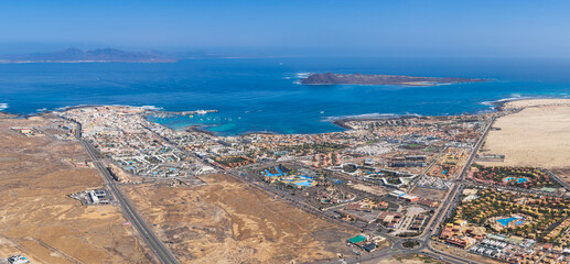 Stunning high level aerial panoramic landscape image of the town of Corralejo, harbor and Lobos Island, Fuerteventura, Canary Islands, Spain