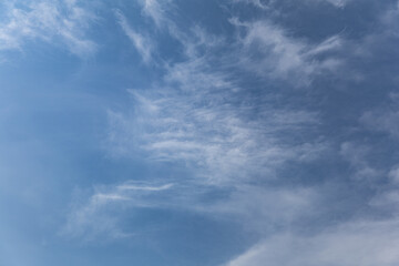 Blue Sky Filled with Fluffy White Clouds