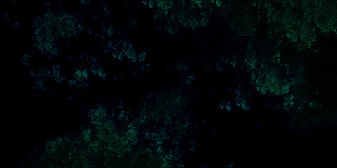 Abstract dark green and tyle colored background. Dark marble fractal design art on a dark canvas. 