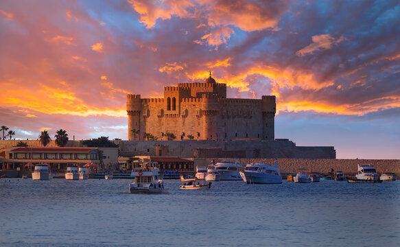 Harbour and boats in Alexandria near Qaitbay Citadel, famous view of Egypt at sunset - Alexandria