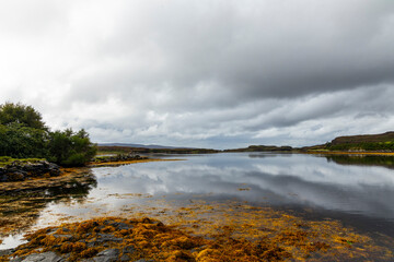 Dunvegan Castle overlooks the Isle of Skye’s coast, surrounded by manicured gardens, exotic plants and a small harbor. Historic interiors reveal centuries of heritage in a stunning natural setting.