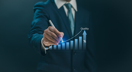 Quality increase and reduce cost Business strategy concept ,Businessman holding pen show goal or objective setting with virtual graph for cost control and quality management of business organization