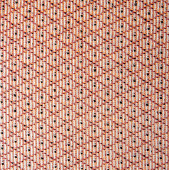 Dense brick-colored diamond-shaped texture.Patterned fabric for furniture...